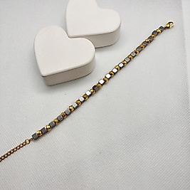 Dorika ve küp detaylı 2 renkli çelik bileklik