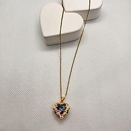 İçi yaner döner taşlı kafes kalp çelik kolye