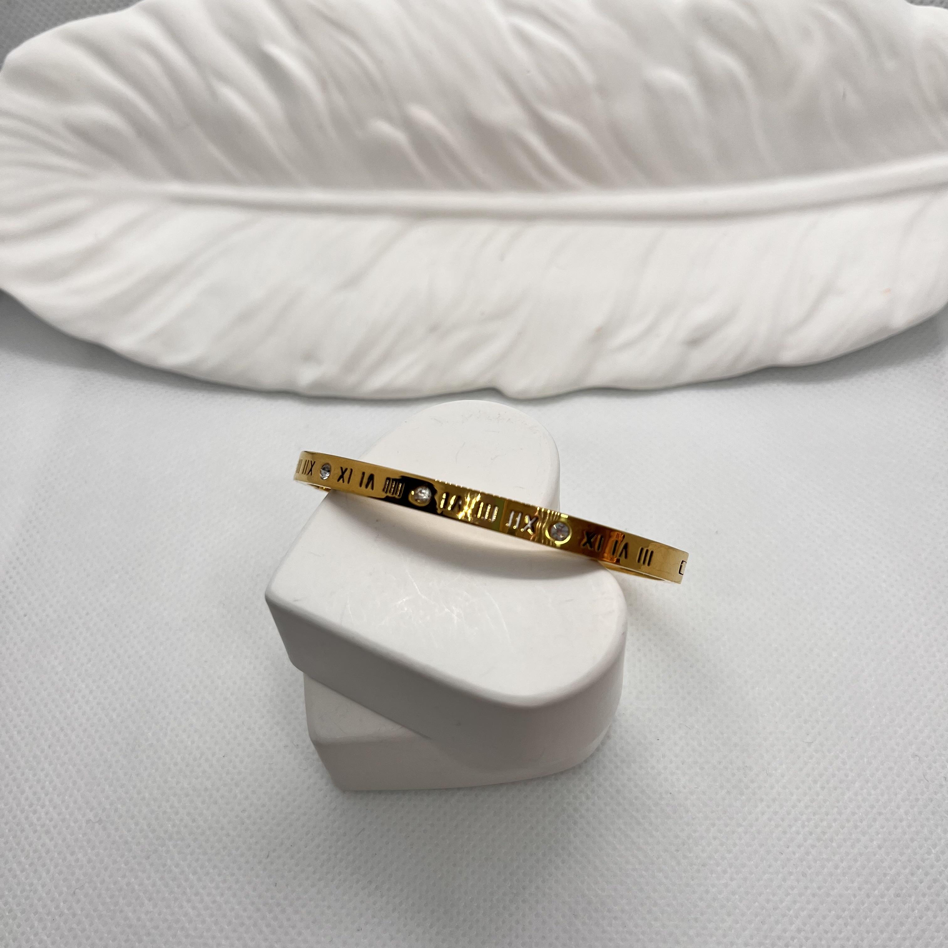 Roma rakamlı taşlı 58 mm cartier çelik kelepçe